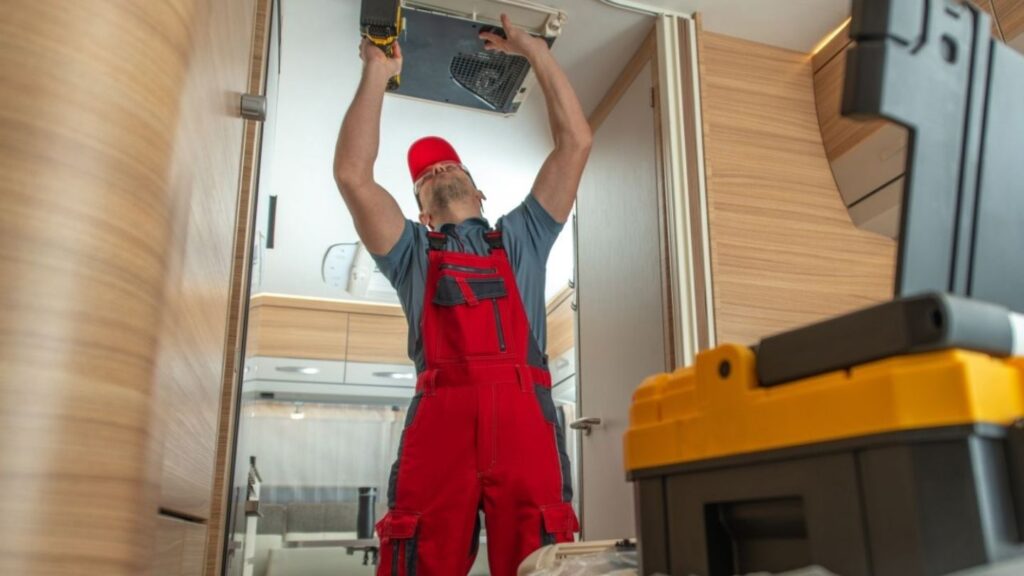 Mobile RV repair van set up for on-site air conditioner service