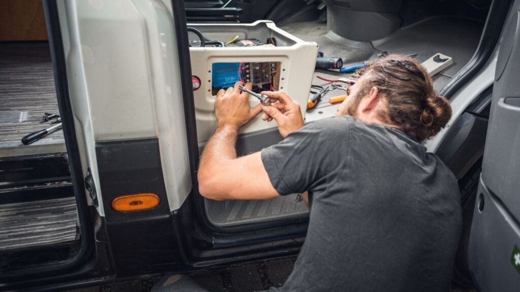RV fuse box and 12V panel during electrical system troubleshooting
