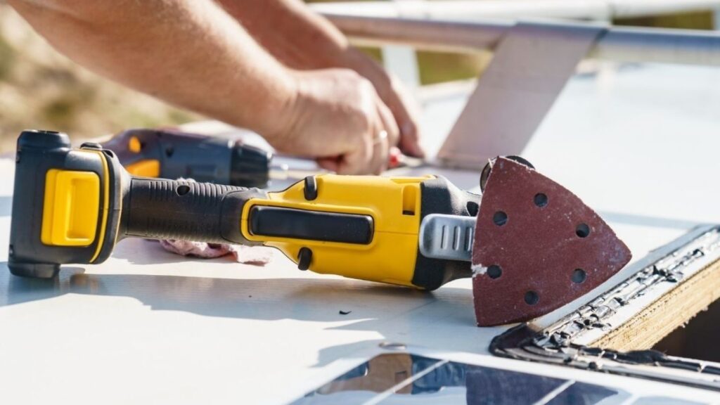 Resealing an RV roof seam to prevent water leaks and ceiling damage